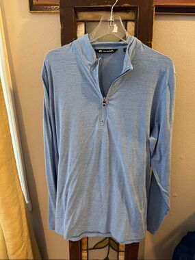 TravisMathew Men's The Heater 1/4 Zip pullover